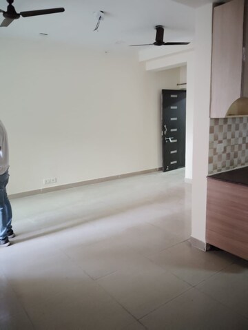 Living Room in 3 BHK Apartment at Amrapali Golf Homes, Sector 4, Greater Noida – for Sale
