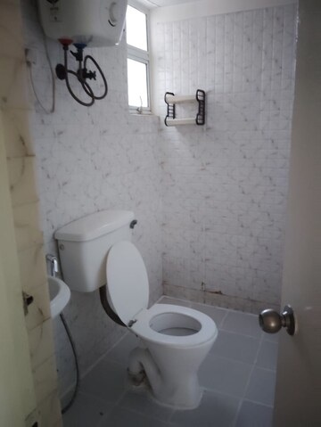 Bathroom in 3 BHK Apartment at Amrapali Golf Homes, Sector 4, Greater Noida – for Sale