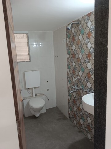 Bathroom in 2 BHK Apartment at Deeplaxmi Shreeji Meadows, Katrap – for Sale