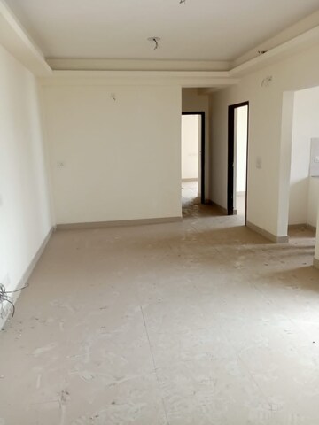 Living Room in 3 BHK Apartment at Amrapali Golf Homes, Sector 4, Greater Noida – for Sale