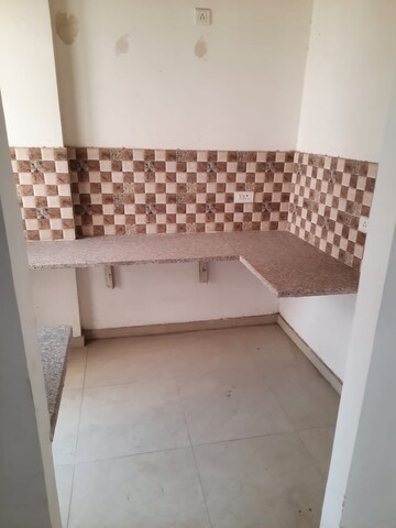 Kitchen in 3 BHK Apartment at Amrapali Golf Homes, Sector 4, Greater Noida – for Sale