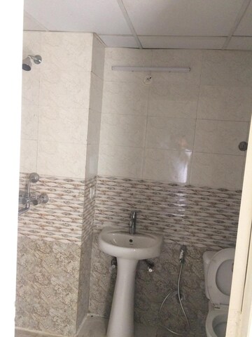 Bathroom in 3 BHK Apartment at Amrapali Golf Homes, Sector 4, Greater Noida – for Sale