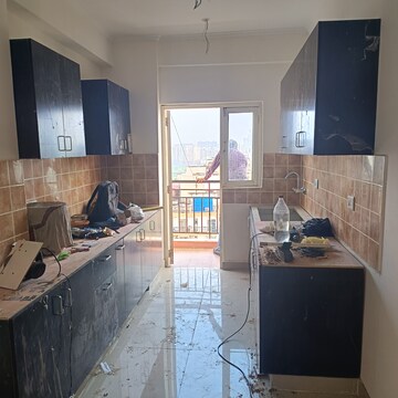 Kitchen in 3 BHK Apartment at Amrapali Silicon City, Sector 76 – for Sale