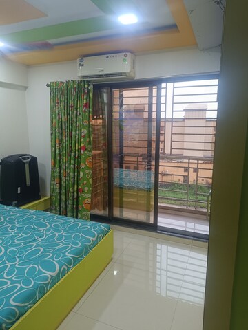 Bedroom in 2 BHK Apartment at Tricity Skyline, Sanpada – for Rent
