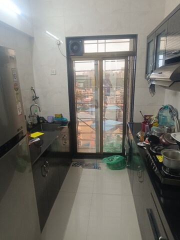 Kitchen in 2 BHK Apartment at Tricity Skyline, Sanpada – for Rent