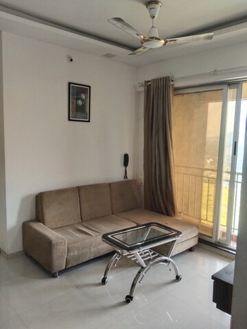 Living Room in 2 BHK Apartment at Murbad Road – for Sale
