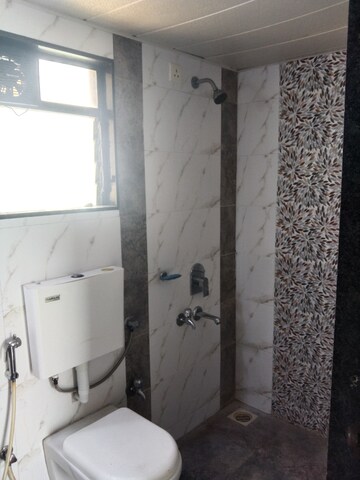 Bathroom in 2 BHK Apartment at Murbad Road – for Sale