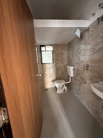Bathroom in 2 BHK Apartment at Murbad Road – for Sale