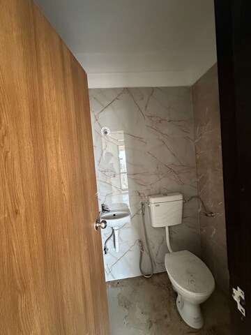 Bathroom in 2 BHK Apartment at Murbad Road – for Sale