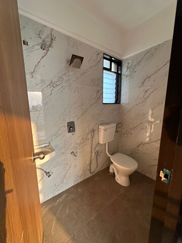 Bathroom in 2 BHK Apartment at Murbad Road – for Sale