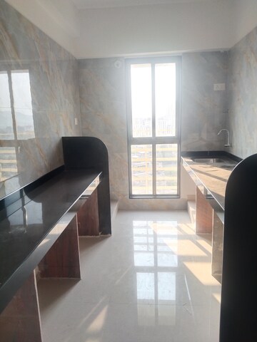 Kitchen in 2 BHK Apartment at Murbad Road – for Sale