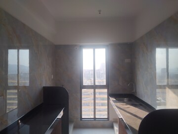 Kitchen in 2 BHK Apartment at Murbad Road – for Sale