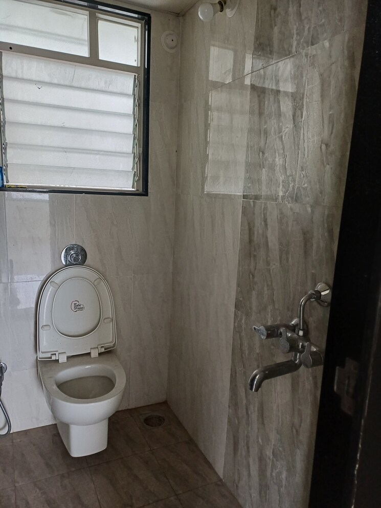 Bathroom, paranjape-schemes-abhiruchi-parisar 2 Bedroom 750 Sq.Ft. Apartment In Dhayari Pune 7579805