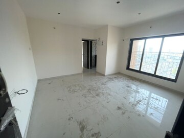 Living Room in 1 BHK Apartment at Harshal Devchhaya, Dahisar East – for Sale