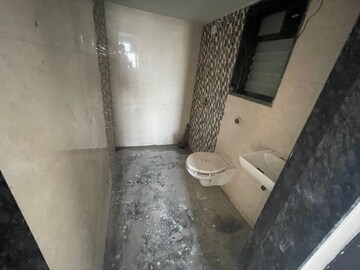 Bathroom in 1 BHK Apartment at Harshal Devchhaya, Dahisar East – for Sale