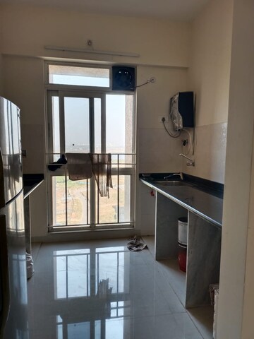 Kitchen in 2.5 BHK Apartment at Vijay Orovia, Ghodbunder Road – for Sale