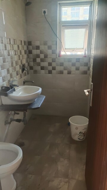 Bathroom in 2.5 BHK Apartment at Apex Athena, Sector 75 – for Sale