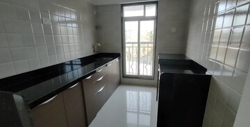 Kitchen in 1 BHK Apartment at Crescent sky Heights, Dahisar East – for Sale