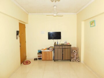 Living Room in 1 BHK Apartment at Galaxy Heights, Goregaon West – for Sale