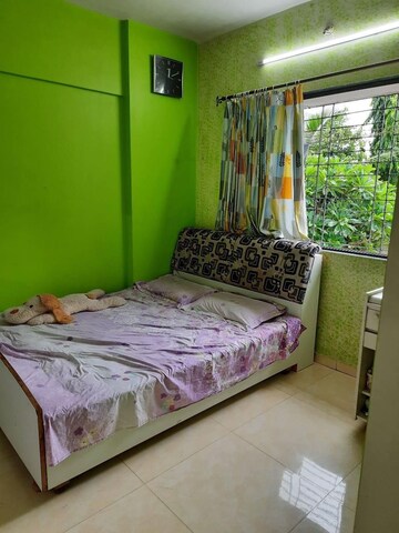 Bedroom in 1 BHK Apartment at Girishikhar Apartment, Borivali East – for Sale