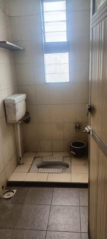 Bathroom in 2 BHK Apartment at Lokhandwala Vinay Tower, Kandivali East – for Sale