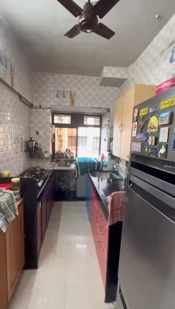 Kitchen in 1 BHK Apartment at Om Krishna CHS, Dahisar East – for Sale