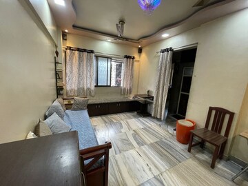 Living Room in 1 BHK Apartment at Uphar CHS Borivali, Borivali East – for Sale