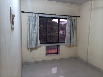 Room in 2 BHK Apartment at Rutu Estate, Brahmand – for Sale