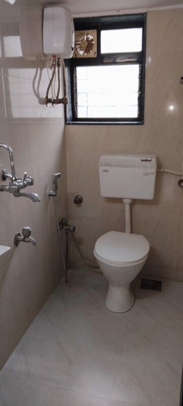 Bathroom in 2 BHK Apartment at Vile Parle East – for Sale
