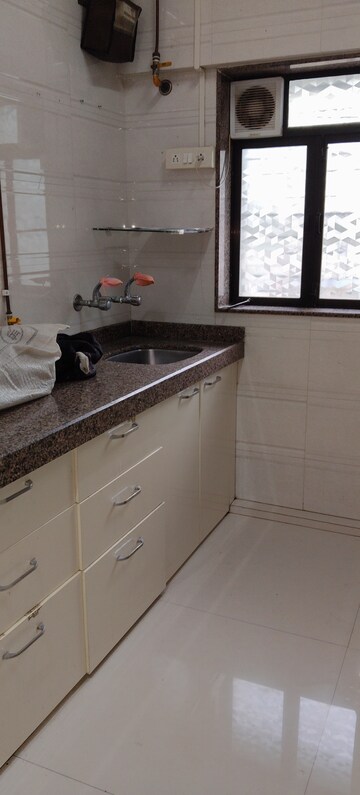 Kitchen in 2 BHK Apartment at Vile Parle East – for Sale