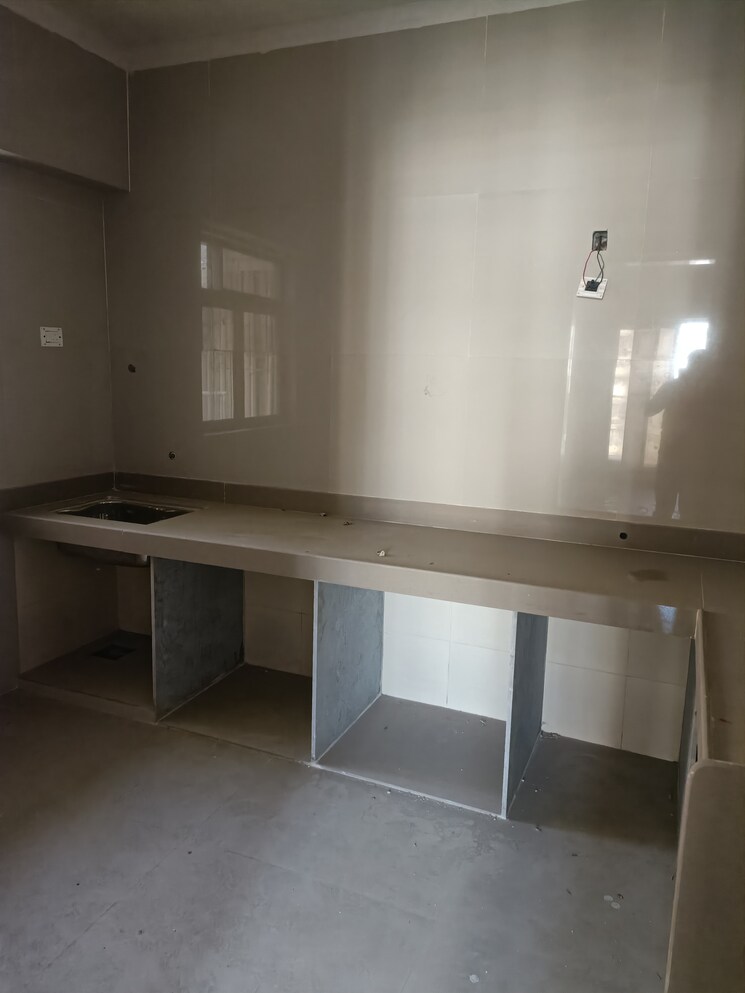 Kitchen, cosmos-horizon-phase-2 2 Bedroom 705 Sq.Ft. Apartment In Pokhran Road No Two Thane 7589732