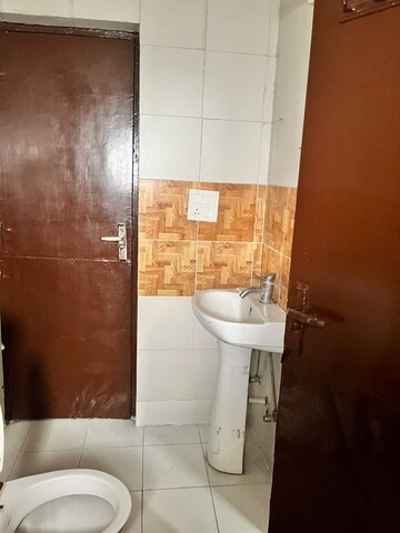Bathroom in 2 BHK Apartment at Panchsheel Wellington, Sain Vihar – for Sale