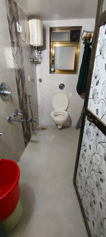 Bathroom in 2 BHK Apartment at Brahmand CHS, Brahmand – for Sale