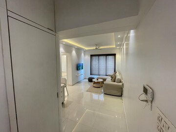 Living Room in 2 BHK Apartment at Rustomjee Azziano Wing K, Vrindavan Society – for Sale