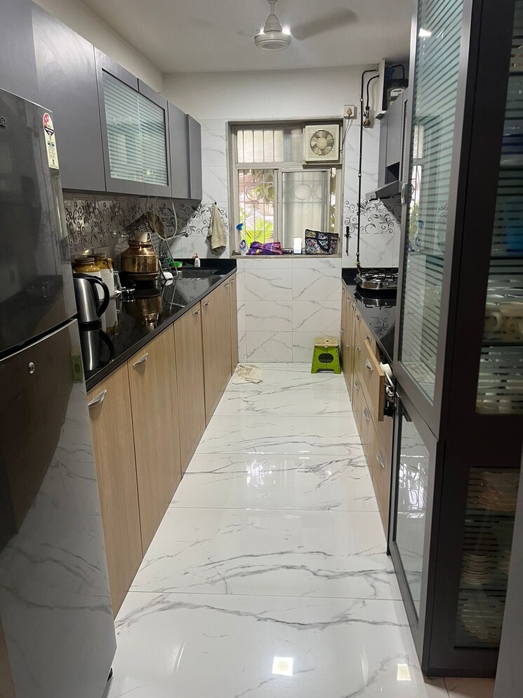 Kitchen, yari road 4 Bedroom 5000 Sq.Ft. Villa In Yari Road Mumbai 7591004