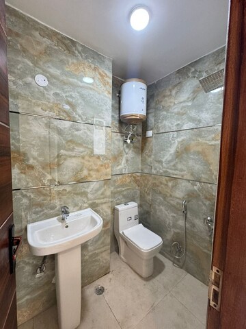 Bathroom in 3 BHK Builder Floor at Palm Residency Chhatarpur, Chattarpur – for Sale
