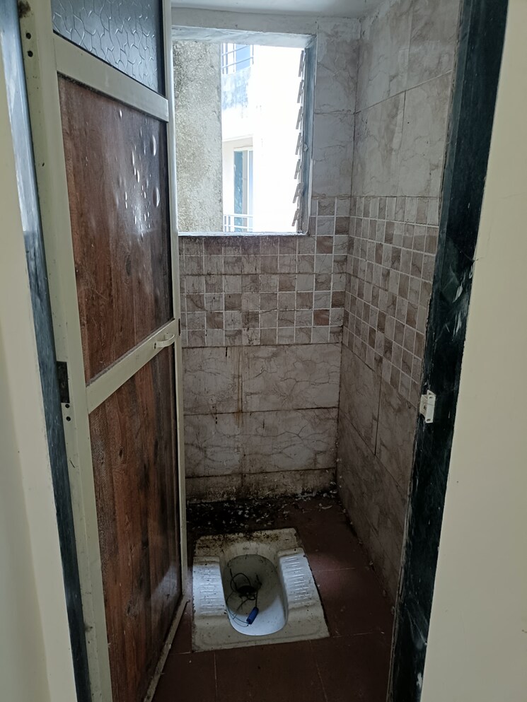 Bathroom, omkar-sara-paradise 1 Bedroom 695 Sq.Ft. Apartment In Badlapur East Thane 7591618