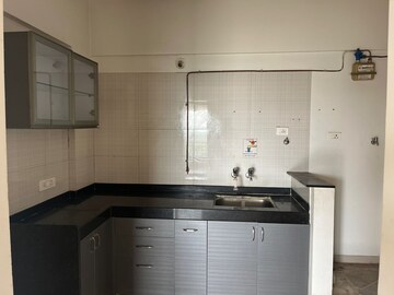 Kitchen in 1.5 BHK Apartment at Nyati Evita, Dhanori – for Sale
