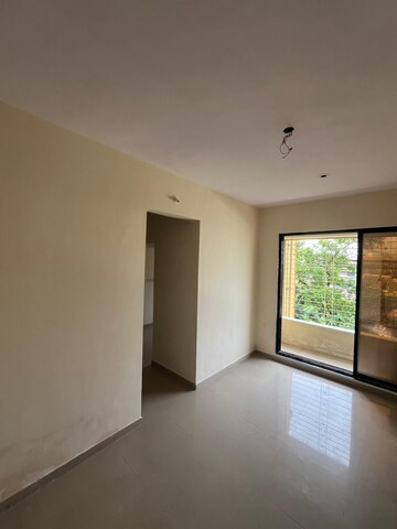 Room in 1 BHK Apartment at Dalalbuildcon Vasant Spring Woods, Badlapur East – for Sale