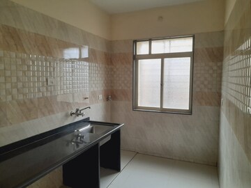 Kitchen in 1 BHK Apartment at Thanekar Hillcrest, Badlapur East – for Sale