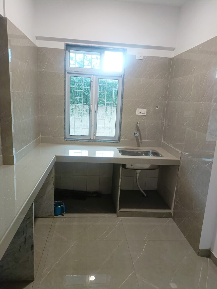 Kitchen, cosmos-classique 1 Bedroom 460 Sq.Ft. Apartment In Ghodbunder Road Thane 7592656