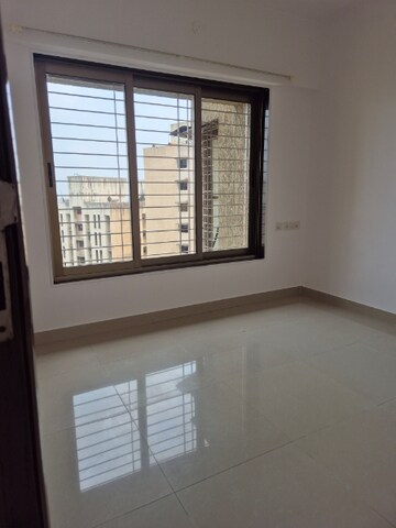 Room in 2 BHK Apartment at Acme Ozone, Manpada – for Sale
