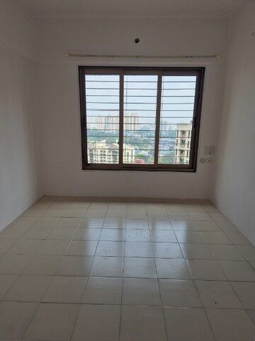 Room in 2 BHK Apartment at Acme Ozone, Manpada – for Sale