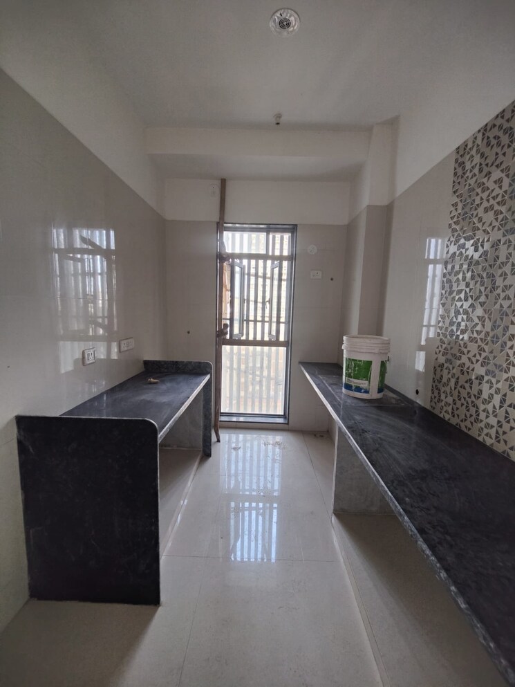 Kitchen, magnum-tower 2 Bedroom 733 Sq.Ft. Apartment In Parel Mumbai 7593337