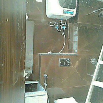 Bathroom in 1 BHK Apartment at Maya Green Lotus Saksham, International Airport Road – for Sale