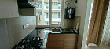Kitchen in 1 BHK Apartment at Maya Green Lotus Saksham, International Airport Road – for Sale