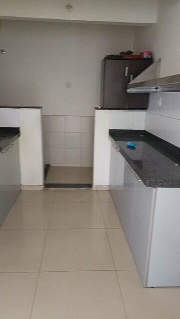 Kitchen in 4 BHK Apartment at Mantra Sky Homes, Magarpatta City – for Sale