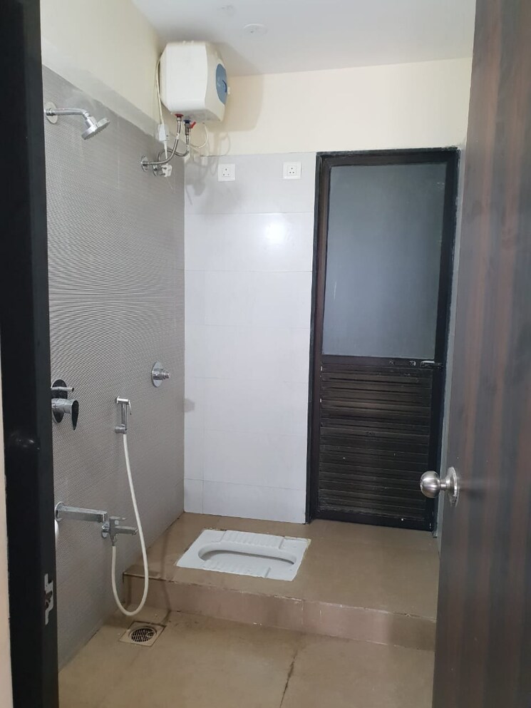 Bathroom, dosti-planet-north 2 Bedroom 717 Sq.Ft. Apartment In Shilphata Thane 7593717