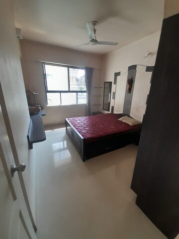 Bedroom in 2 BHK Apartment at Dorabjee Paradise Building A&B Condominium, Mohammadwadi – for Rent