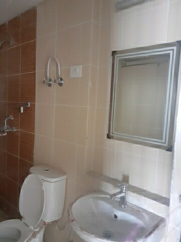 Bathroom in 2 BHK Apartment at JKG Palm Court, Sector 16c Greater Noida – for Sale